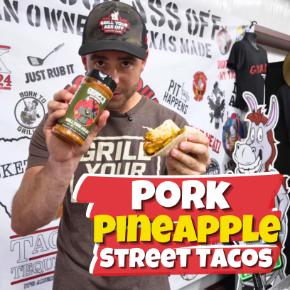 Crispy Mango Habanero pork street tacos topped with pineapple, peppers, onions, and Oaxaca cheese on a flat top griddle.
